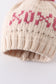 Cream XOXO knit beanie pom pom hat