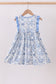 Blue floral cross smocked ruffle dress