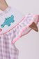 Purple dinosaur smocked gingham bubble