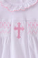 White cross smocked ruffle bubble