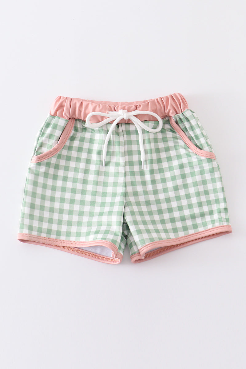 Green plaid boy swim trunks