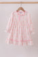Pink nutcracker print ruffle gown