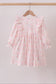 Pink nutcracker print ruffle dress
