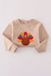 Beige turkey french knot top