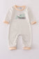 Cream excavator applique stripe romper
