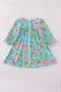Green floral character applique dress