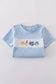 Blue Dr. Seuss embroidery smocked top