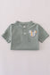 Green character applique shorts set