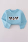 Blue character embroidery top