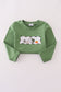 Green fishing embroidery top