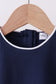Navy flutter sleeve scalloped top