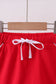 Red scallop hem bow skort