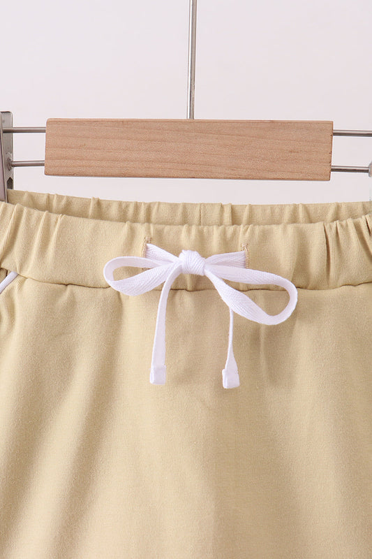 Khaki scallop hem bow skort