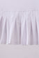 White pleated skort
