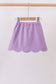 Dark purple scallop hem bow skort