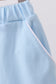 Mint scallop hem bow skort