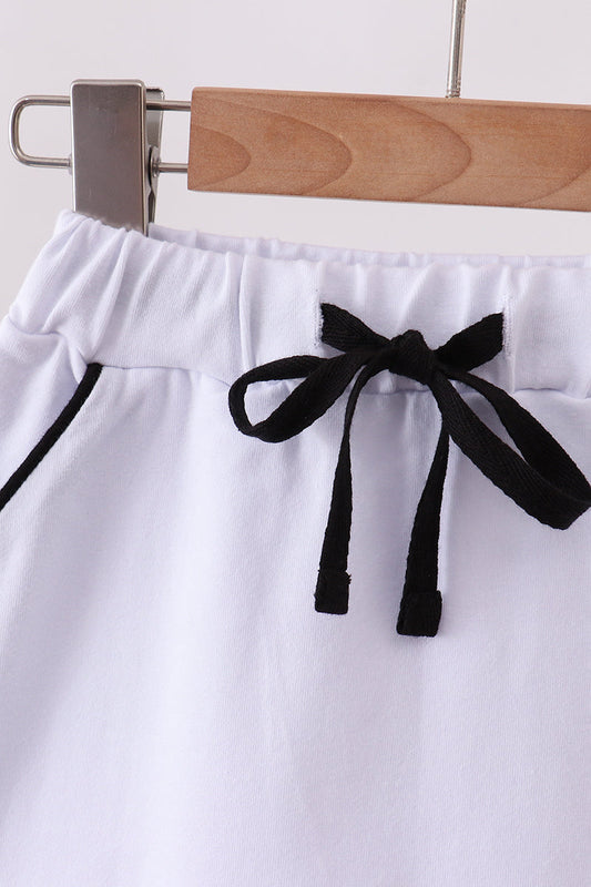 Snow white scallop hem bow skort