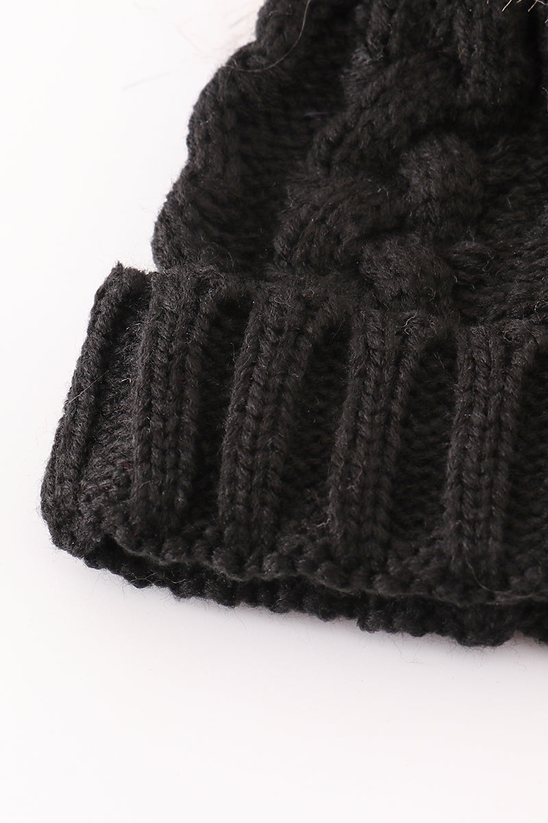 Black pompom cable beanie