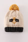 Beige pompom bee cable beanie