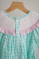 Mint christmas nutcracker hand smocked gingham dress