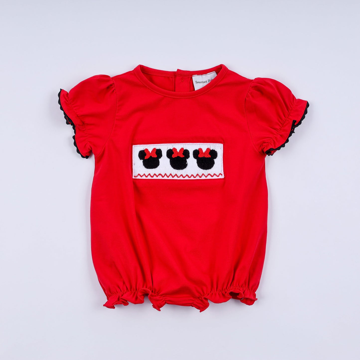 Red character hand smocked bubble