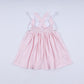 Pink character hand smocked gingham ruffle dress
