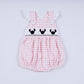 Pink character hand smocked gingham ruffle bubble