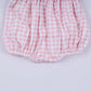 Pink character hand smocked gingham ruffle bubble