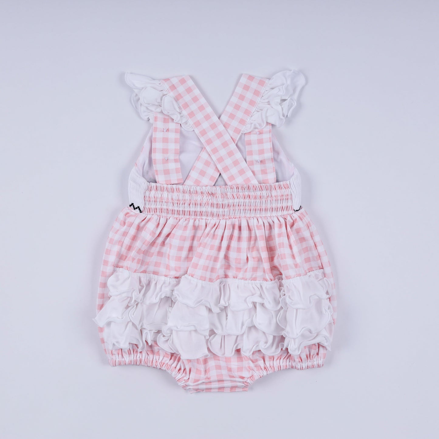 Pink character hand smocked gingham ruffle bubble