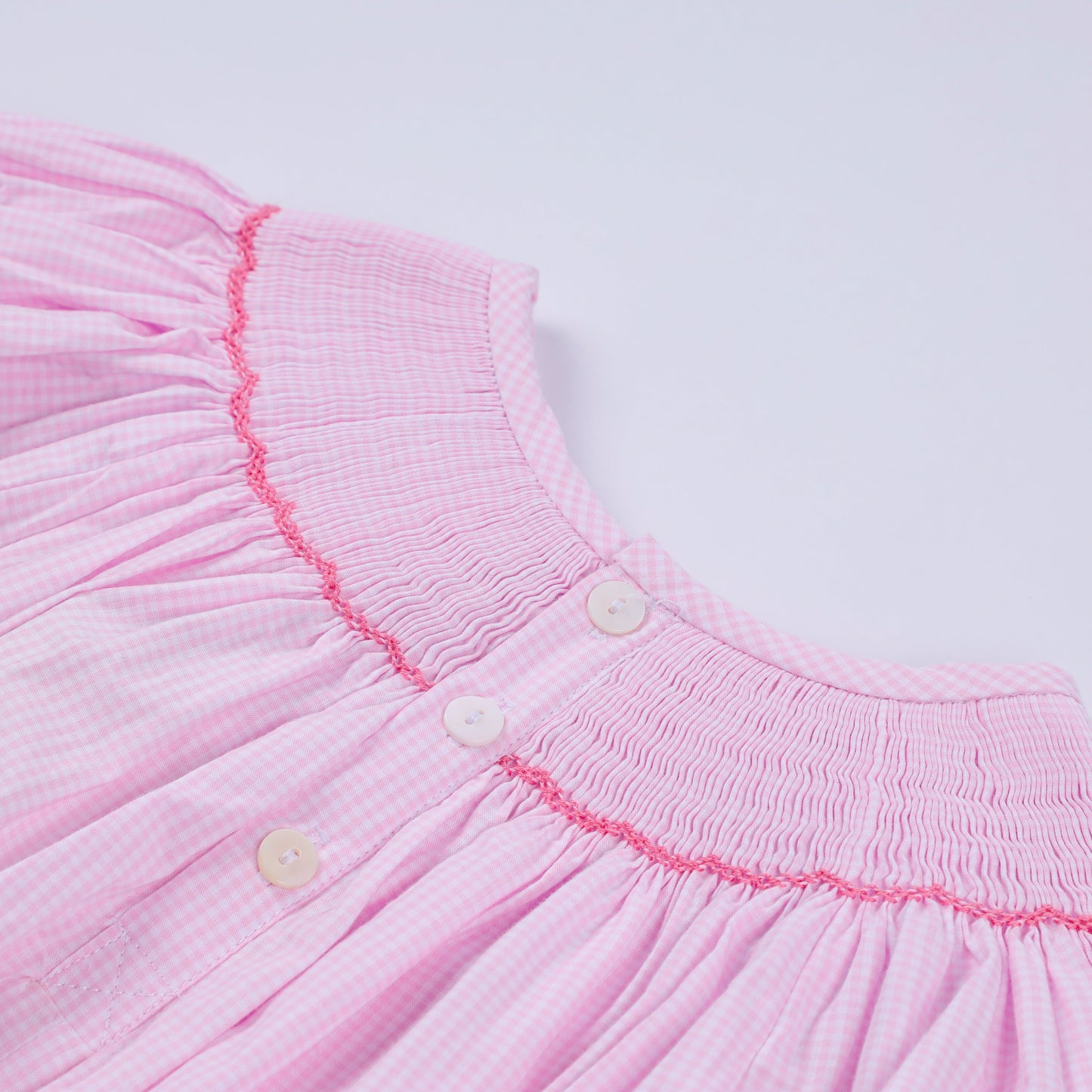 Pink christmas tree hand smocked ruffle romper