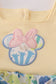 Yellow floral character applique bubble