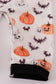 Black pumpkin print romper