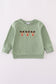 Green reindeer embroidery top