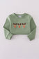 Green reindeer embroidery top