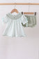 Sage he is risen smocked gingham bloomer set