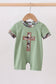 Green camoflage cross applique romper