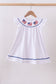 White flag smocked ruffle dress