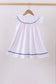 White flag smocked ruffle dress