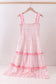 Blush floral smocked tiered dress