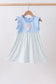 Blue character applique ruffle dress