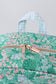 Green floral ruffle backpack